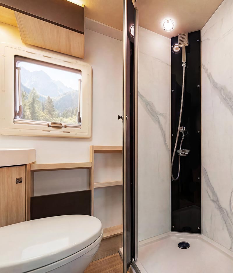 Renaissance applied in Caravan shower Recreational vehicle featuring Renaissance wall cladding in shower